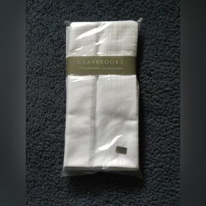 One package mens handerkerchiefs, 13 in package. Brand new, never opened.